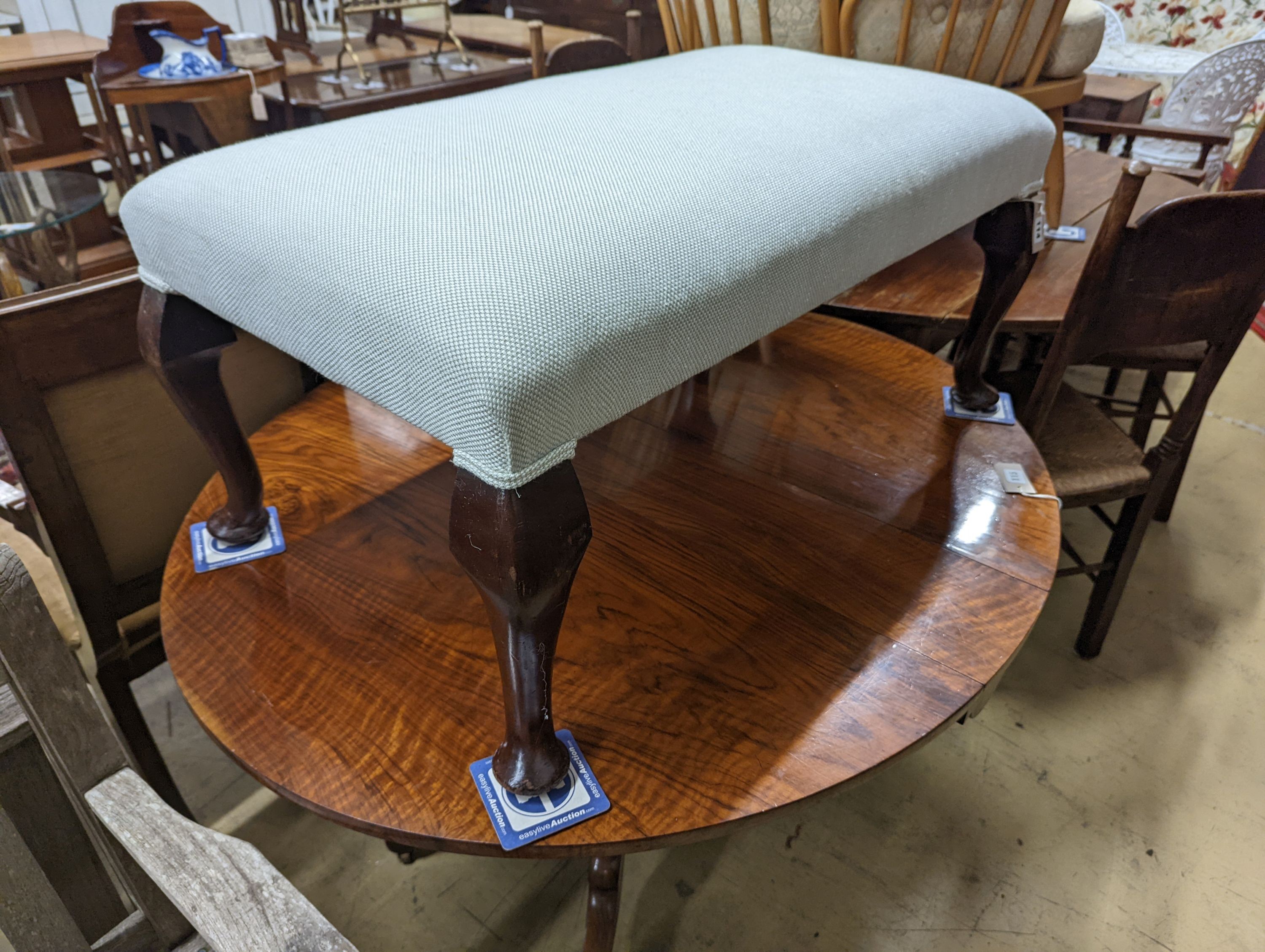 An early 20th century rectangular upholstered dressing stool, length 94cm, depth 54cm, height 42cm